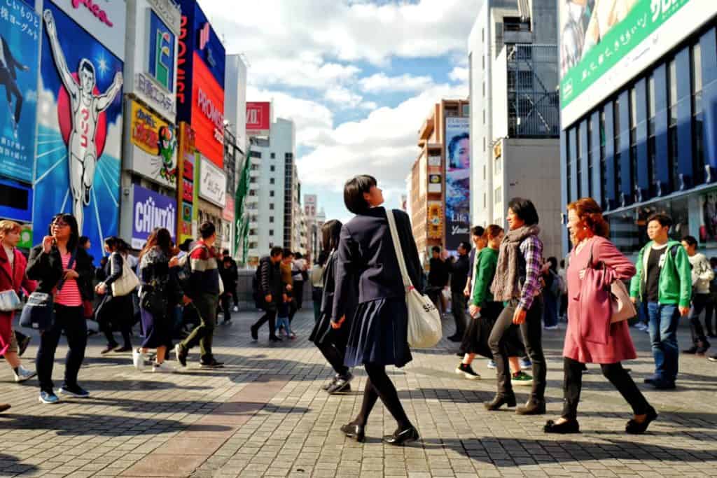 1 day in osaka - visitors walking on the street in Dotonbori Osaka