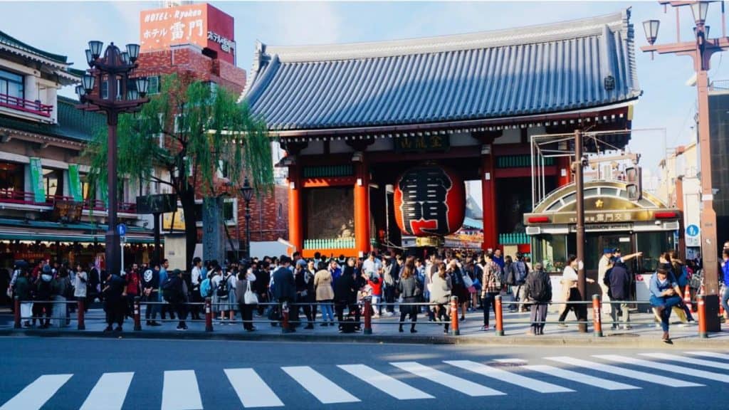 japan itinerary 21 days - tourists standing in front of Sensoji Temple at Tokyo