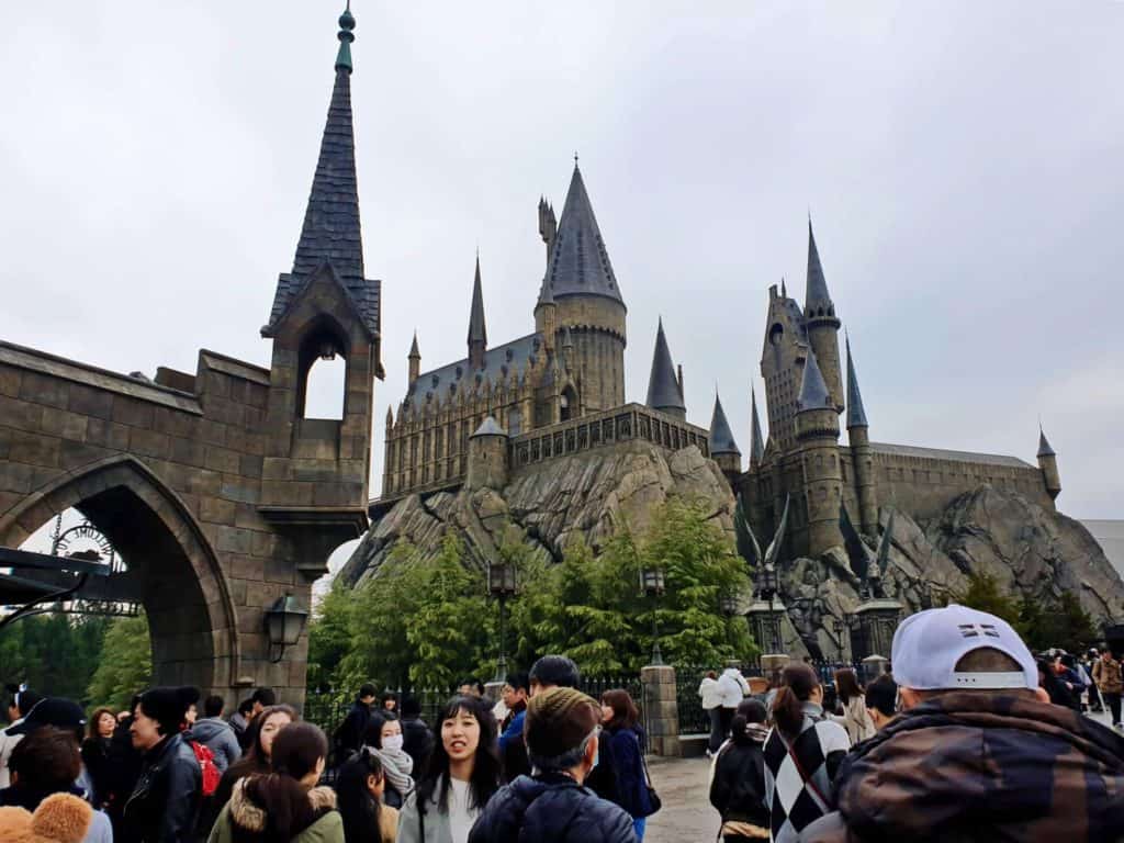 osaka itinerary - visitors pass by The Wizarding World of Harry Potter at Universal Studios Japan
