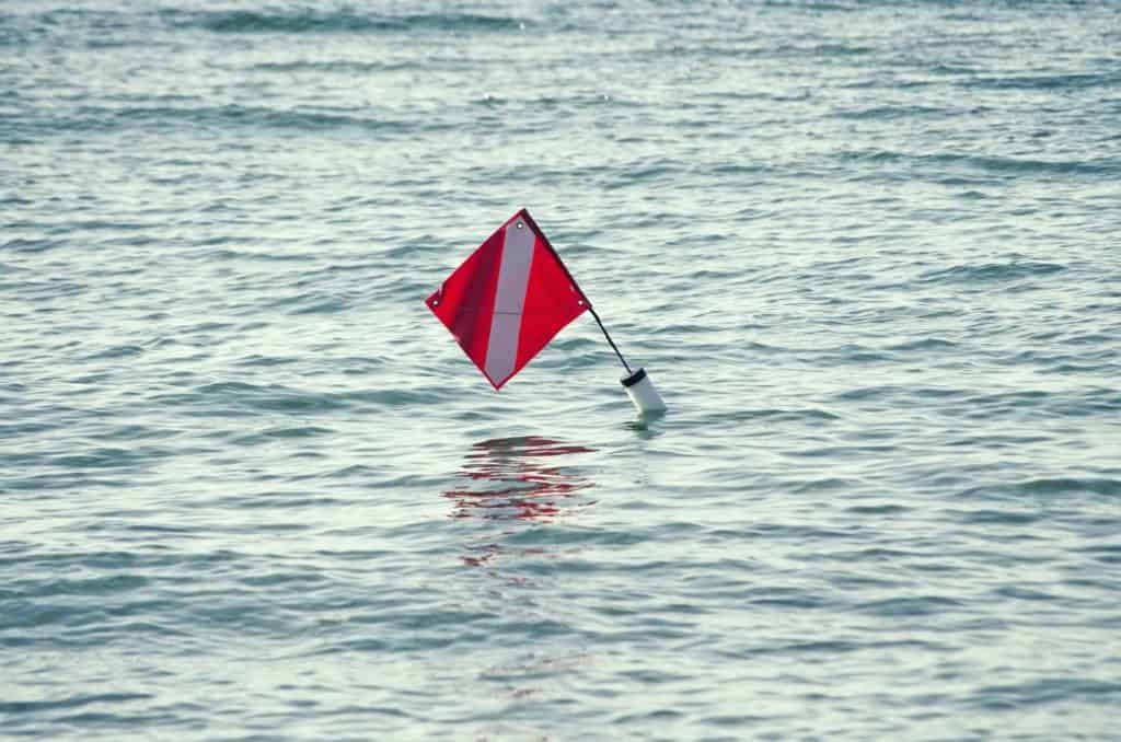 best kayaks for scuba diving - diver down flag
