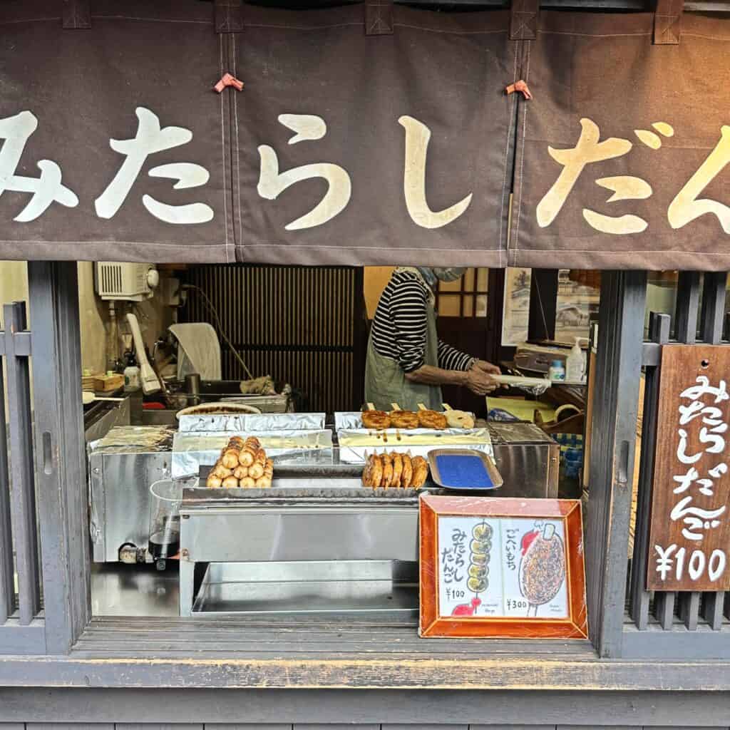 takayama in february - a shop selling dangos in Takayama Old Town