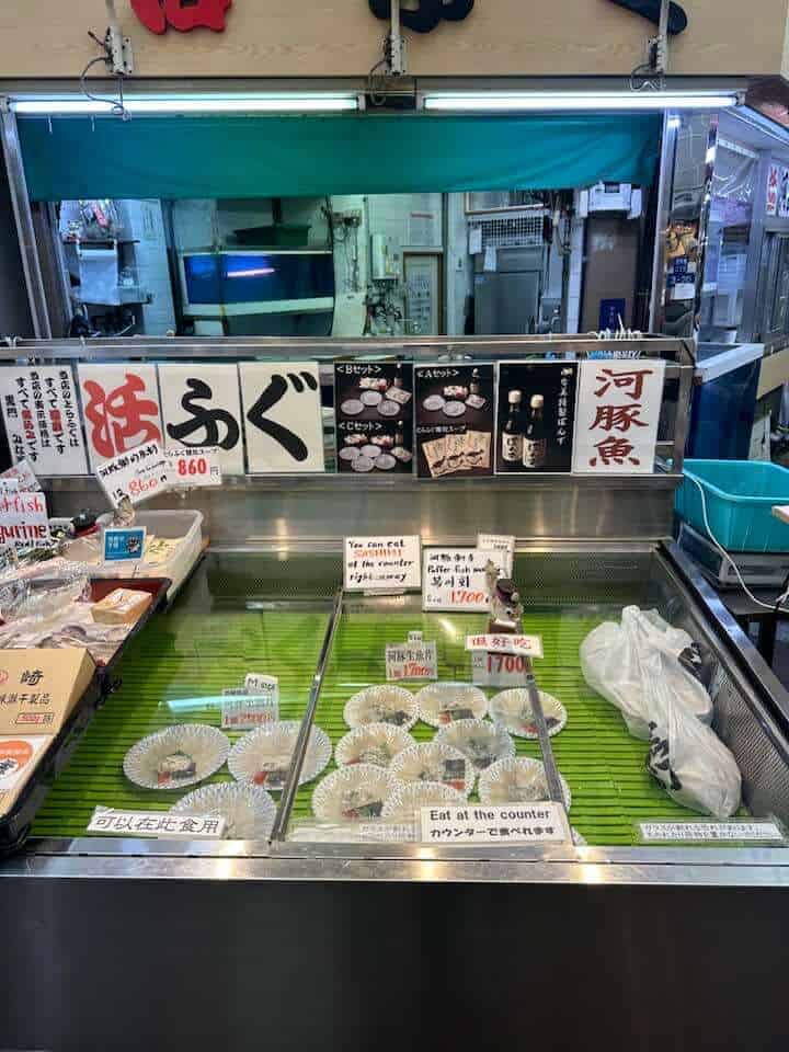 three week japan itinerary - fugu sashimi at Kuromon Market