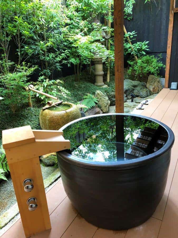 kyoto ryokan with onsen - open-air bath at Kamishichiken Oku
