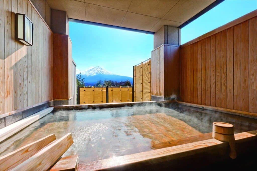 mt fuji ryokan private onsen - the open-air bath in one of the rooms at Wakakusa no Yado Maruei Ryokan
