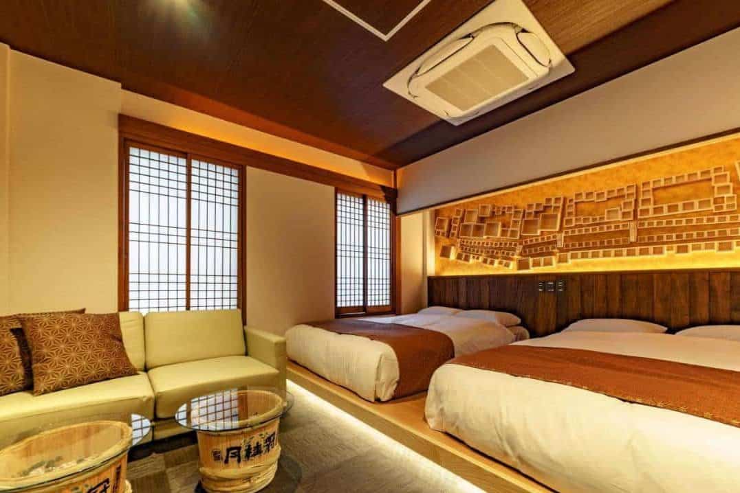 osaka ryokan with private onsen - 2 rooms with air conditioner in one of the rooms at Konjaku-So Shinsaibashi Rooftop SPA
