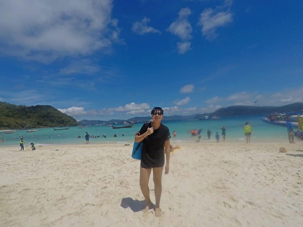 Me posing at the camera after a snorkeling session at a beach in Phuket, Thailand