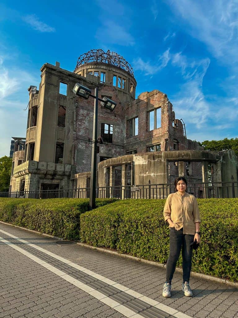 best gift ideas for Japan lovers - me standing in front of the Atomic Bomb Dome in Hiroshima