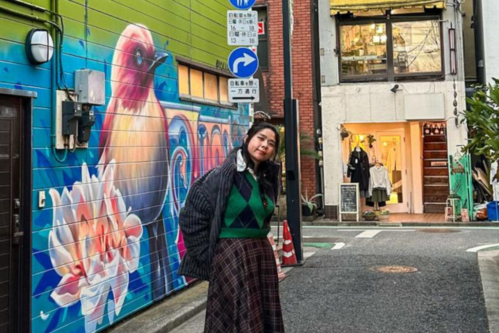 things to do at shimokitazawa - me with the bird mural at shimokitazawa